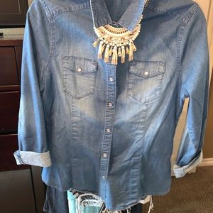 Women’s stretch jean shirt. Jewelry not included.